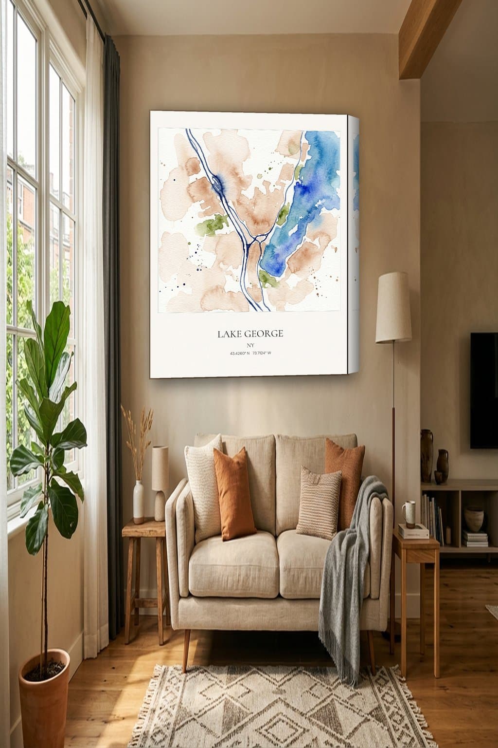 Watercolor map of Lake George, NY on an 18x24 gallery canvas in a room