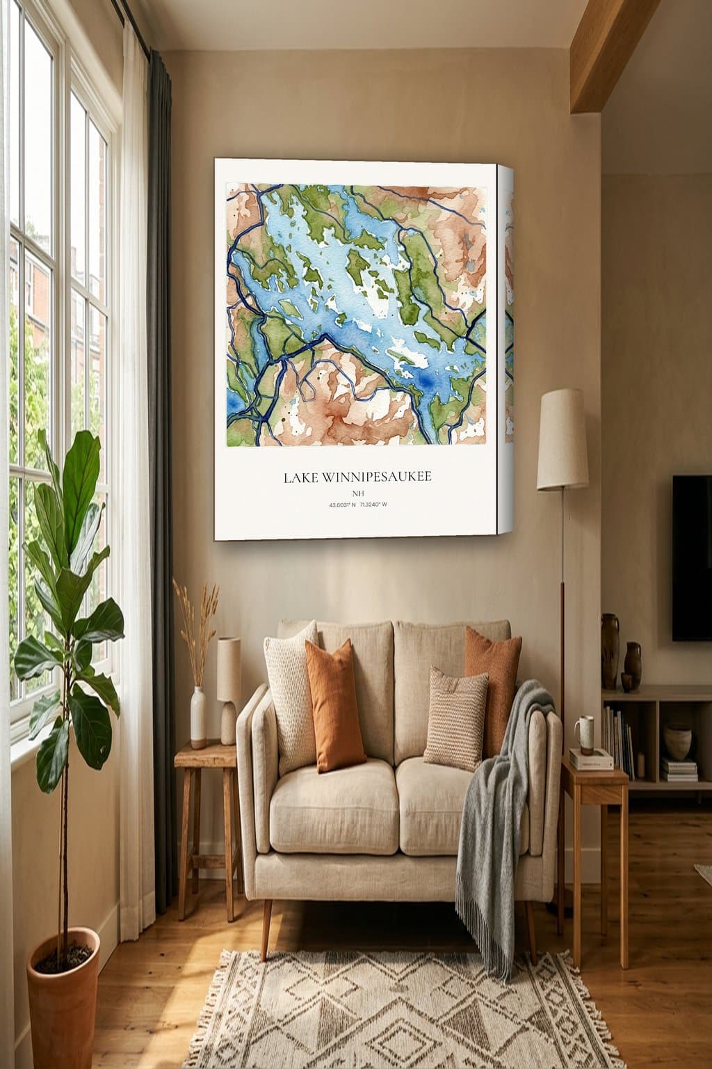 Watercolor map of Lake Winnipesaukee, NH on an 18x24 gallery canvas in a room